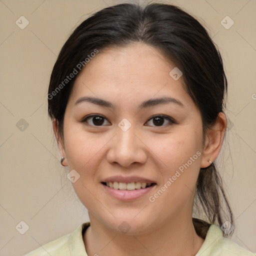 Joyful asian young-adult female with medium  brown hair and brown eyes