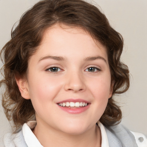 Joyful white child female with medium  brown hair and brown eyes