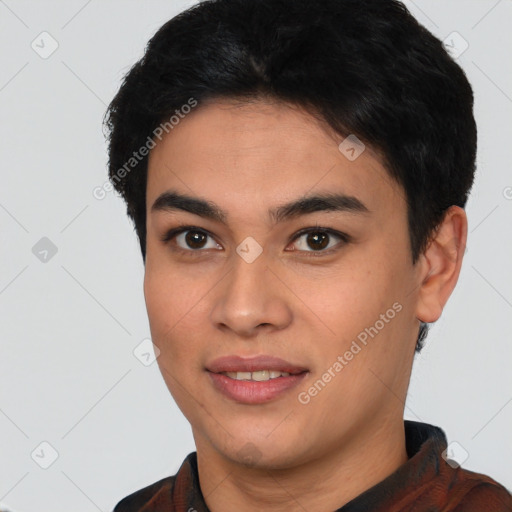 Joyful asian young-adult male with short  black hair and brown eyes