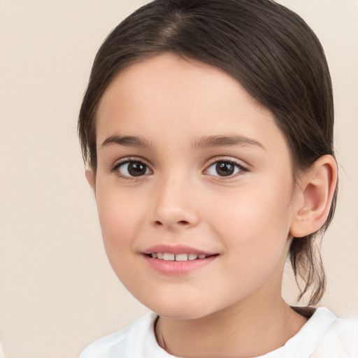 Joyful white child female with medium  brown hair and brown eyes