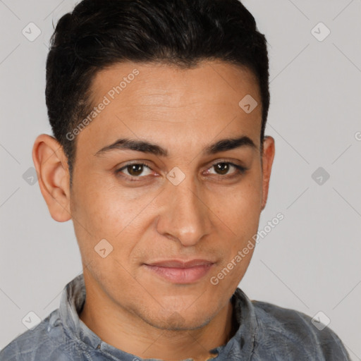 Joyful latino young-adult male with short  black hair and brown eyes