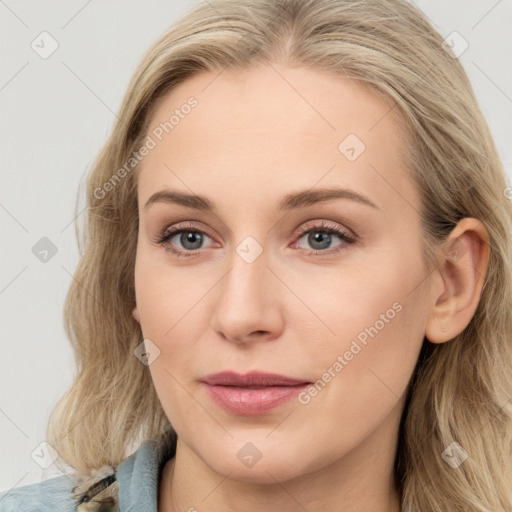 Joyful white young-adult female with long  brown hair and blue eyes