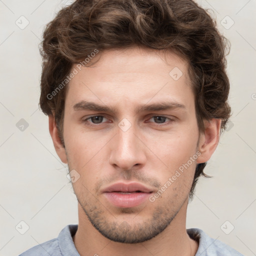 Neutral white young-adult male with short  brown hair and grey eyes