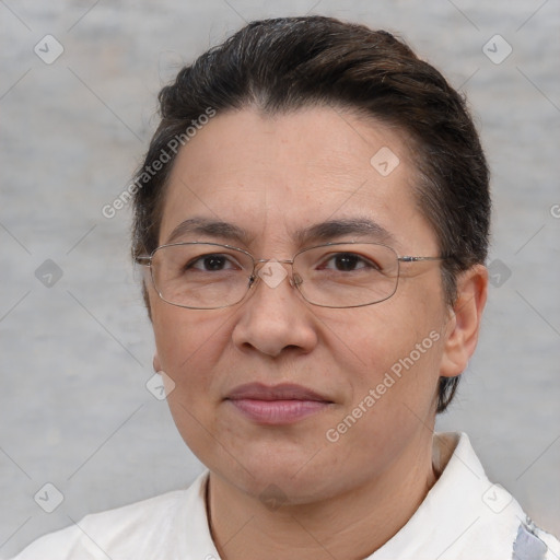 Joyful white adult female with short  brown hair and brown eyes