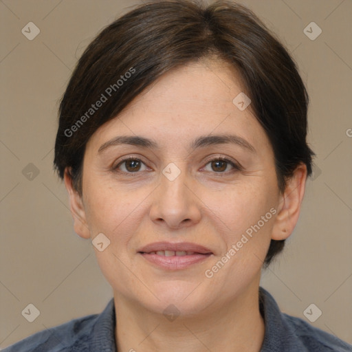 Joyful white adult female with medium  brown hair and brown eyes