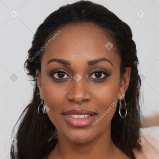 Joyful black young-adult female with long  black hair and brown eyes