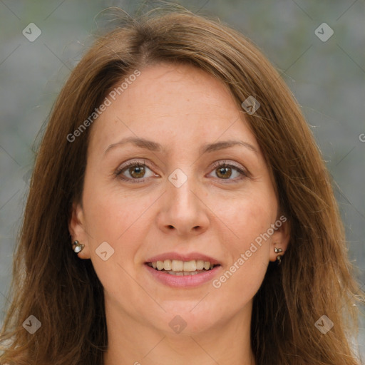 Joyful white adult female with long  brown hair and brown eyes