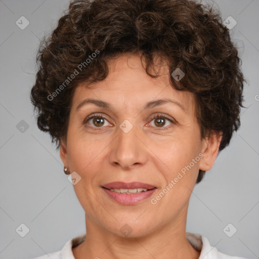 Joyful white adult female with short  brown hair and brown eyes