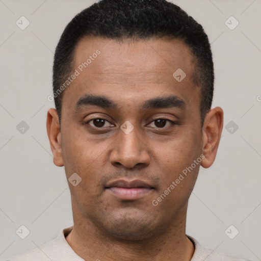 Neutral latino young-adult male with short  black hair and brown eyes