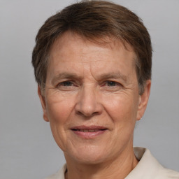 Joyful white middle-aged male with short  brown hair and brown eyes