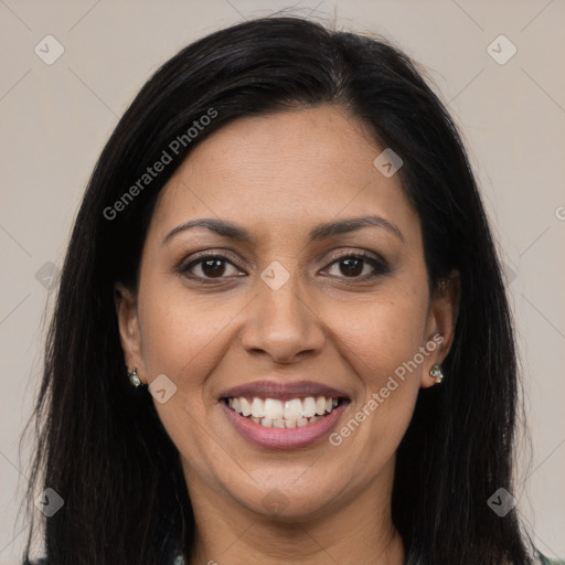 Joyful latino young-adult female with long  brown hair and brown eyes