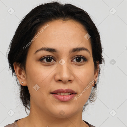 Joyful latino young-adult female with medium  brown hair and brown eyes