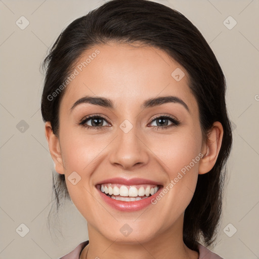 Joyful white young-adult female with medium  brown hair and brown eyes