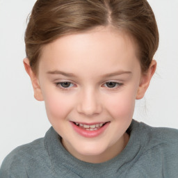 Joyful white child female with short  brown hair and grey eyes