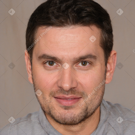 Joyful white adult male with short  brown hair and brown eyes