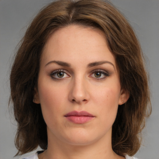 Neutral white young-adult female with medium  brown hair and brown eyes