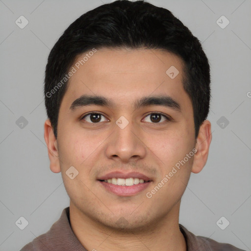 Joyful latino young-adult male with short  black hair and brown eyes