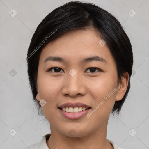 Joyful asian young-adult female with medium  black hair and brown eyes