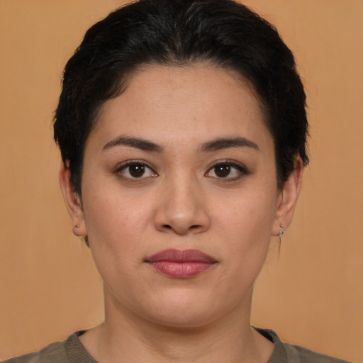 Joyful white young-adult female with medium  brown hair and brown eyes