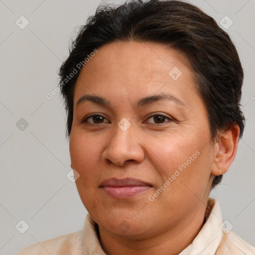 Joyful white adult female with short  brown hair and brown eyes