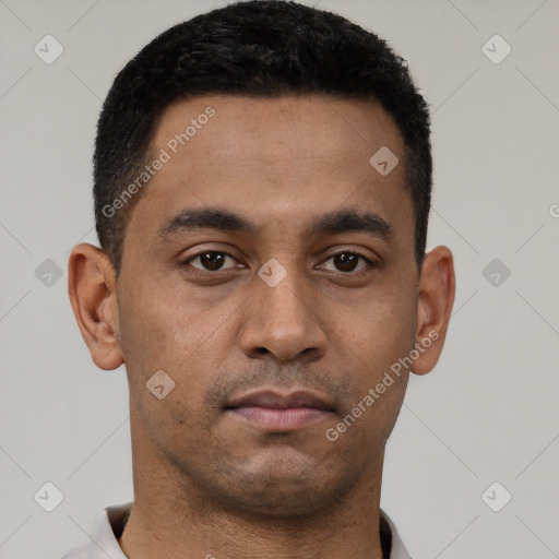 Neutral latino young-adult male with short  brown hair and brown eyes