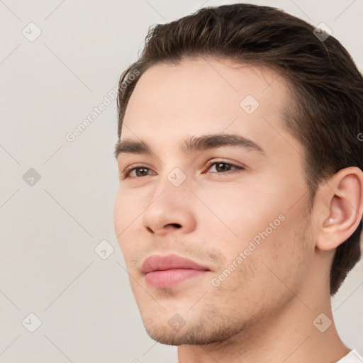 Neutral white young-adult male with short  brown hair and brown eyes