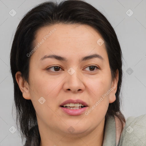 Joyful white adult female with medium  brown hair and brown eyes