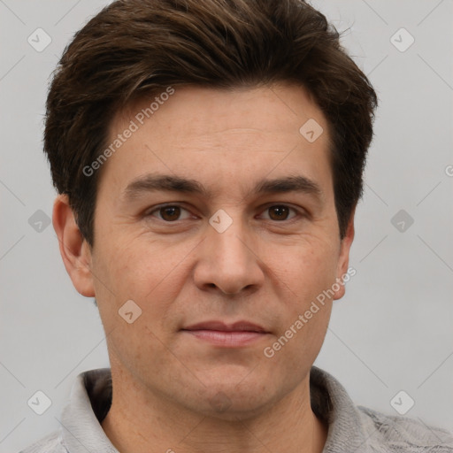 Joyful white adult male with short  brown hair and grey eyes