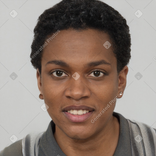 Joyful black young-adult female with short  black hair and brown eyes