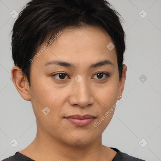 Joyful latino young-adult female with short  brown hair and brown eyes