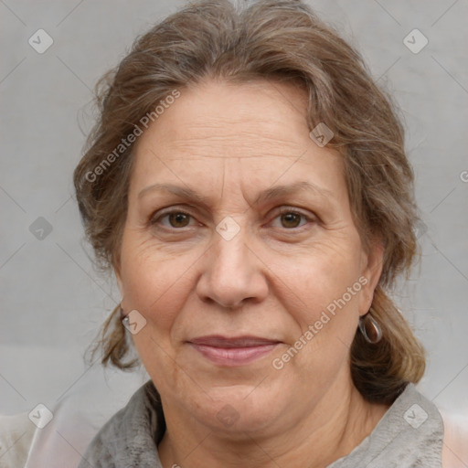 Joyful white middle-aged female with medium  brown hair and brown eyes