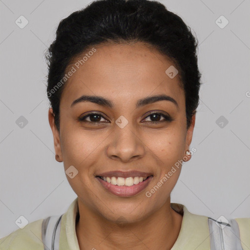 Joyful latino young-adult female with short  black hair and brown eyes