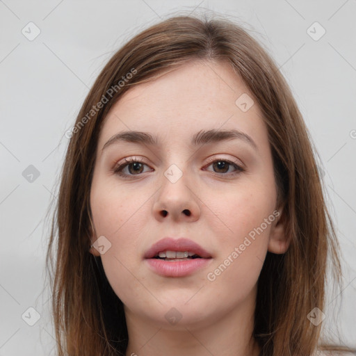 Neutral white young-adult female with long  brown hair and brown eyes