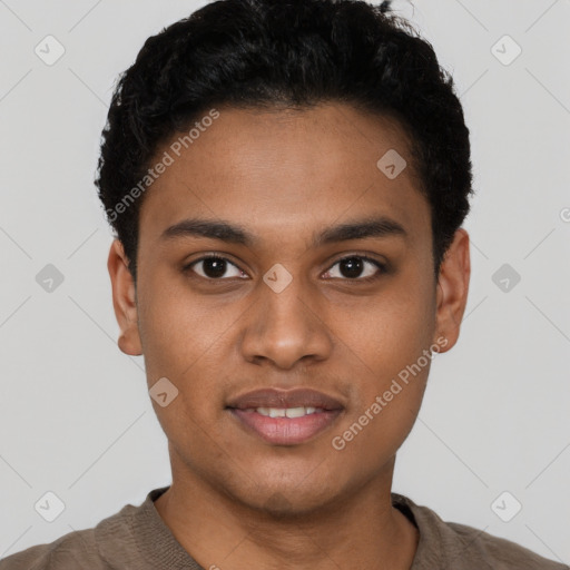 Joyful black young-adult male with short  black hair and brown eyes