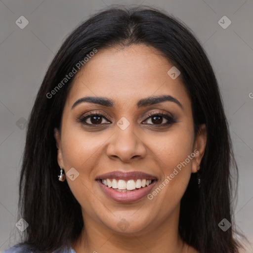 Joyful latino young-adult female with long  brown hair and brown eyes