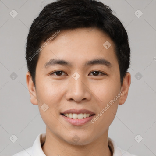 Joyful asian young-adult male with short  black hair and brown eyes