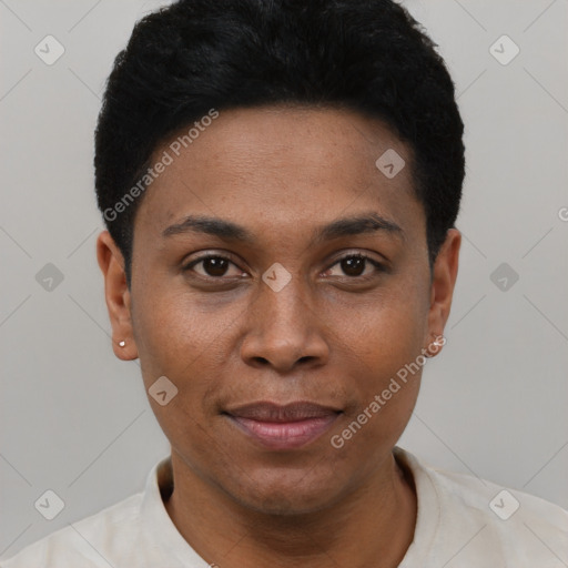 Joyful black young-adult female with short  black hair and brown eyes