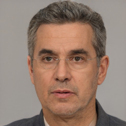 Neutral white middle-aged male with short  brown hair and brown eyes