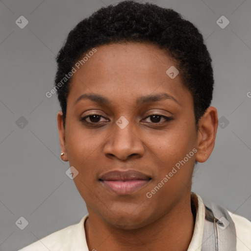 Joyful black young-adult female with short  brown hair and brown eyes