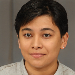 Joyful asian young-adult female with short  brown hair and brown eyes