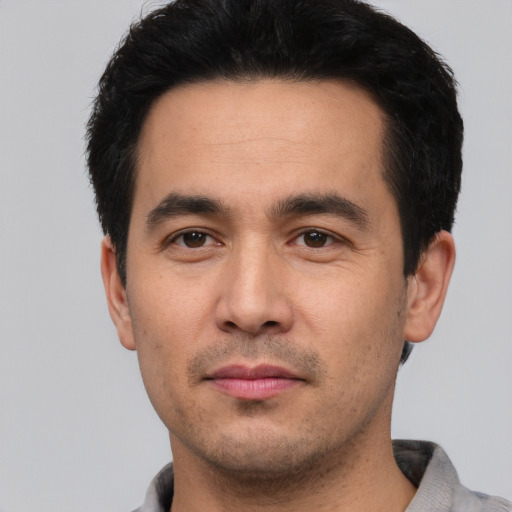 Neutral asian young-adult male with short  black hair and brown eyes