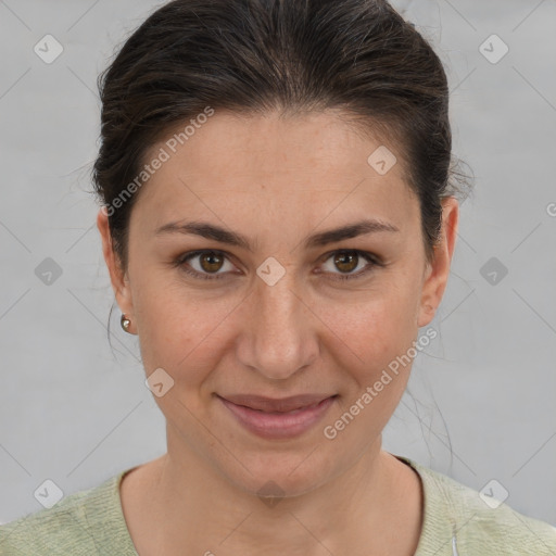 Joyful white adult female with short  brown hair and brown eyes