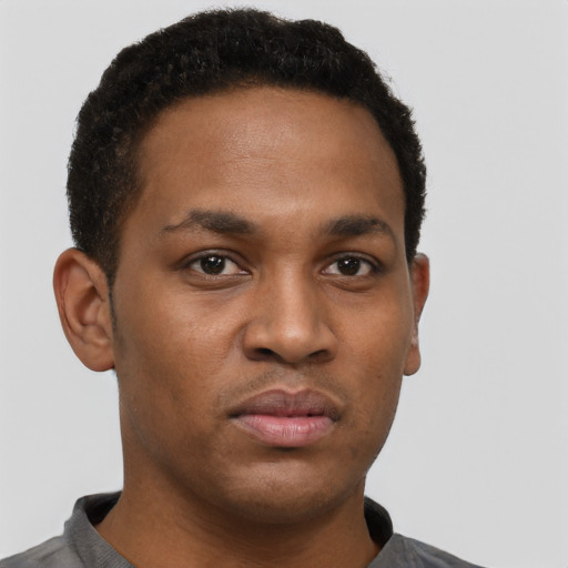 Neutral black young-adult male with short  brown hair and brown eyes
