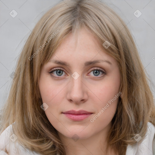 Joyful white young-adult female with medium  brown hair and blue eyes