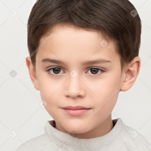 Joyful white child male with short  brown hair and brown eyes