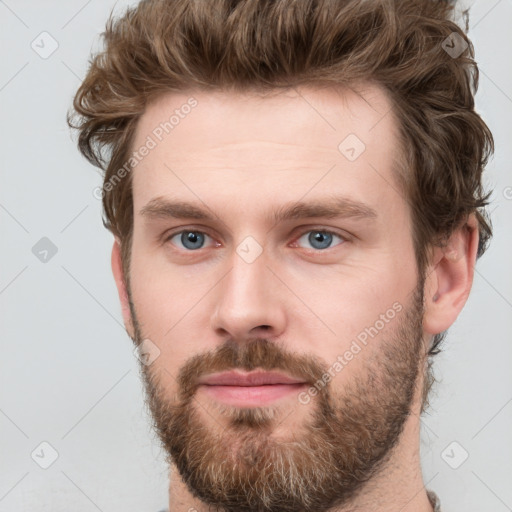 Neutral white young-adult male with short  brown hair and grey eyes