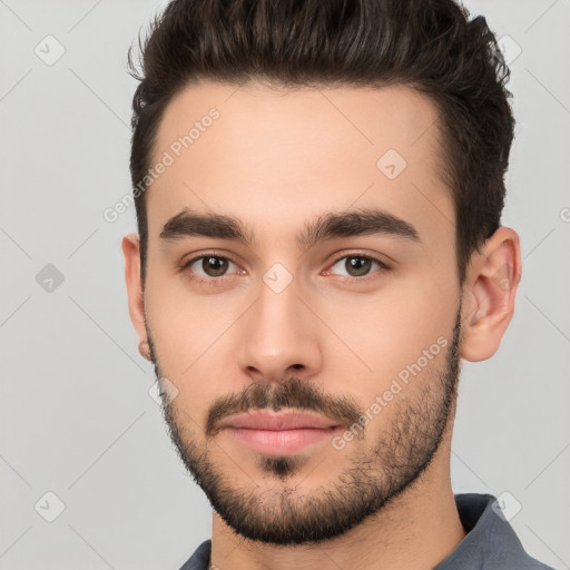 Neutral white young-adult male with short  brown hair and brown eyes