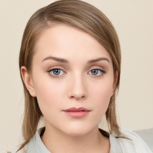 Neutral white young-adult female with medium  brown hair and grey eyes