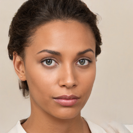 Neutral white young-adult female with short  brown hair and brown eyes