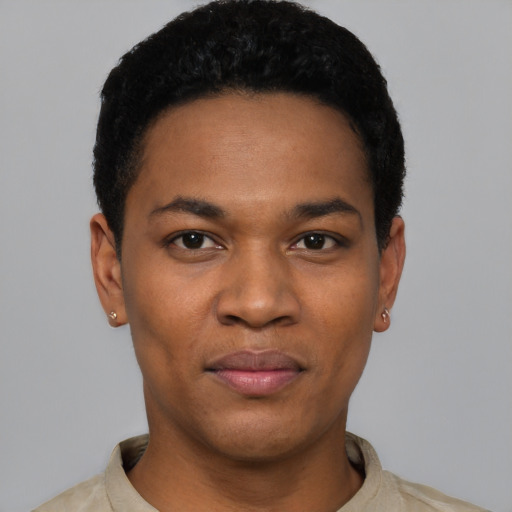 Joyful black young-adult male with short  black hair and brown eyes